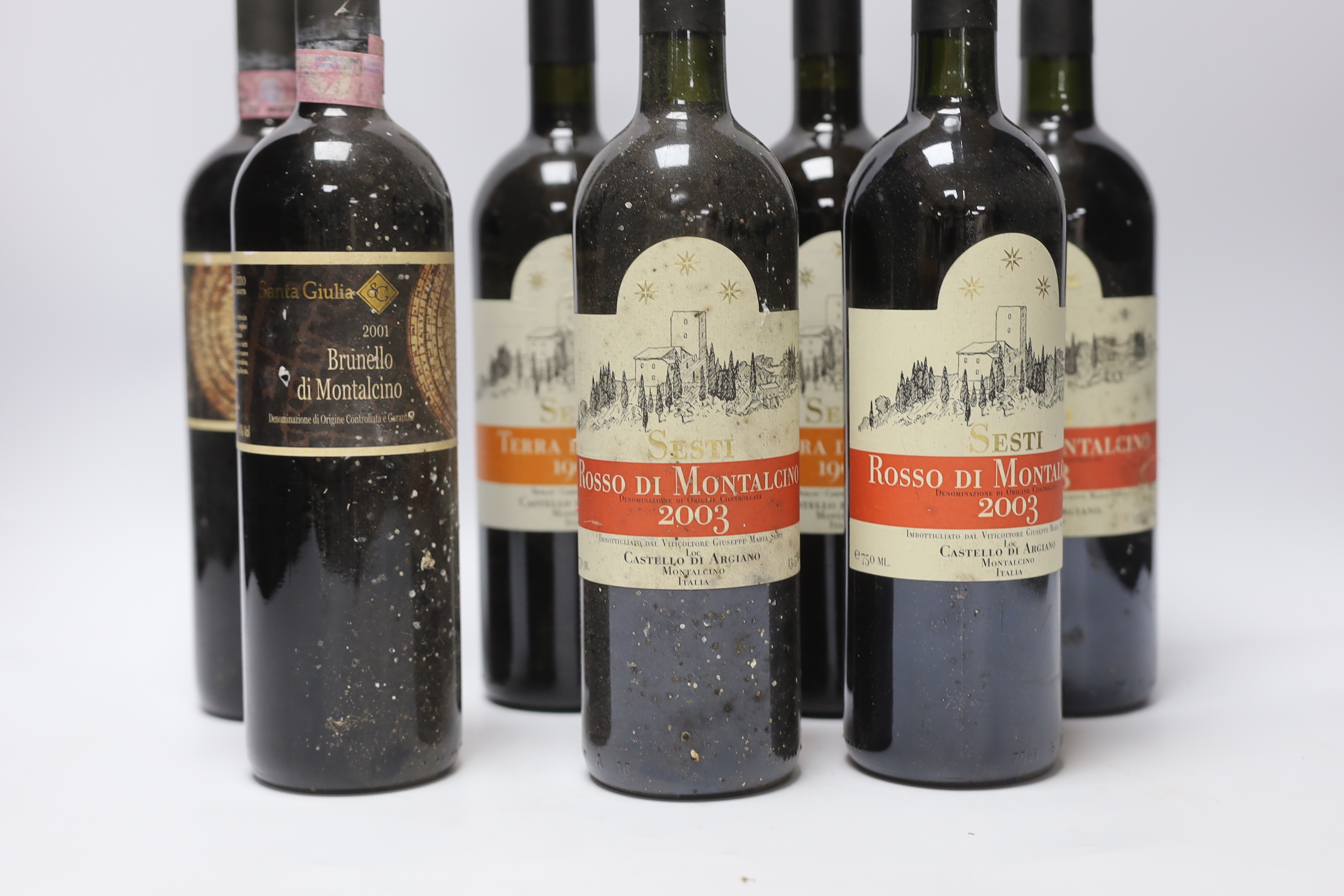 Ten bottles of red wine including three Rossi Di Montalcino 2003, four bottles of Terra Di Siena 1999 and three bottles of Brunello di Montalcino